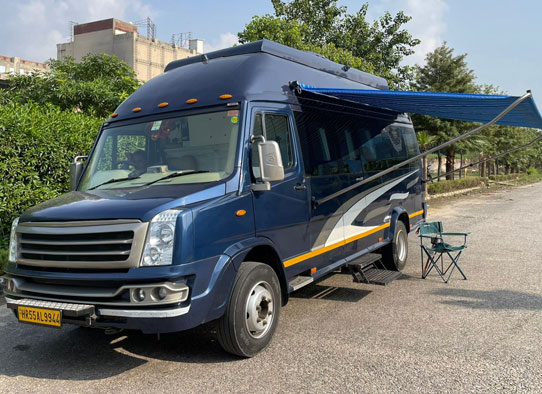 do dham yatra by caravan with toilet washroom sofa cum bed fridge tv hire delhi